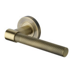 M Marcus Heritage Brass Phoenix Knurled Design Door Handle Lever on Round Rose