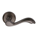 M Marcus Heritage Brass Lisboa Design Door Handle Lever Latch on Round Rose